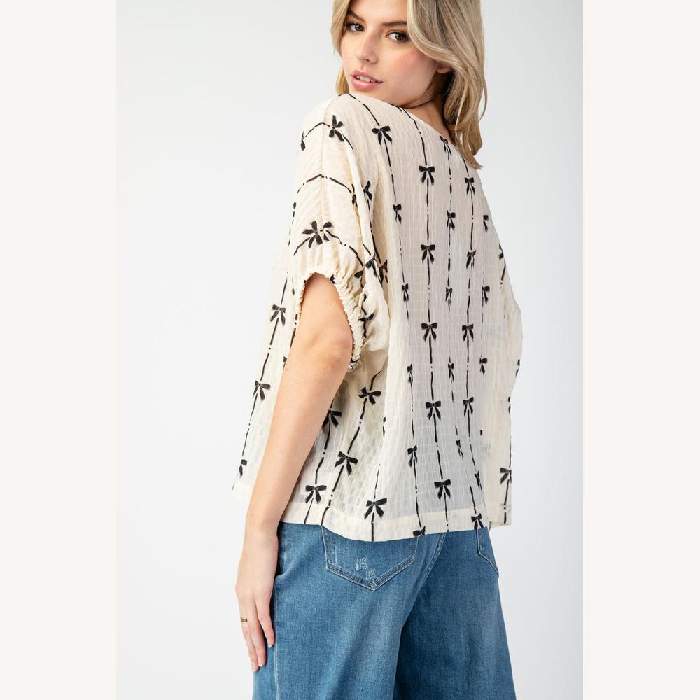 Blouse Femme Beige Texturée avec Nœuds Noirs – Haut Légère en Coton, Manches Élastiquées, Style Décontracté