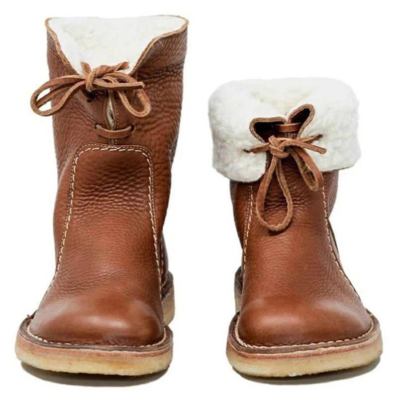 Bottes d'hiver en cuir pour femmes avec revers en fourrure et semelle en caoutchouc 1
