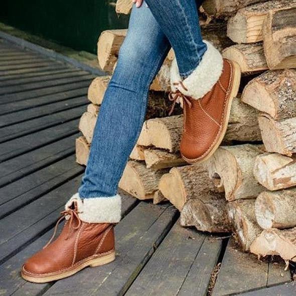 Bottes d'hiver en cuir pour femmes avec revers en fourrure et semelle en caoutchouc 4