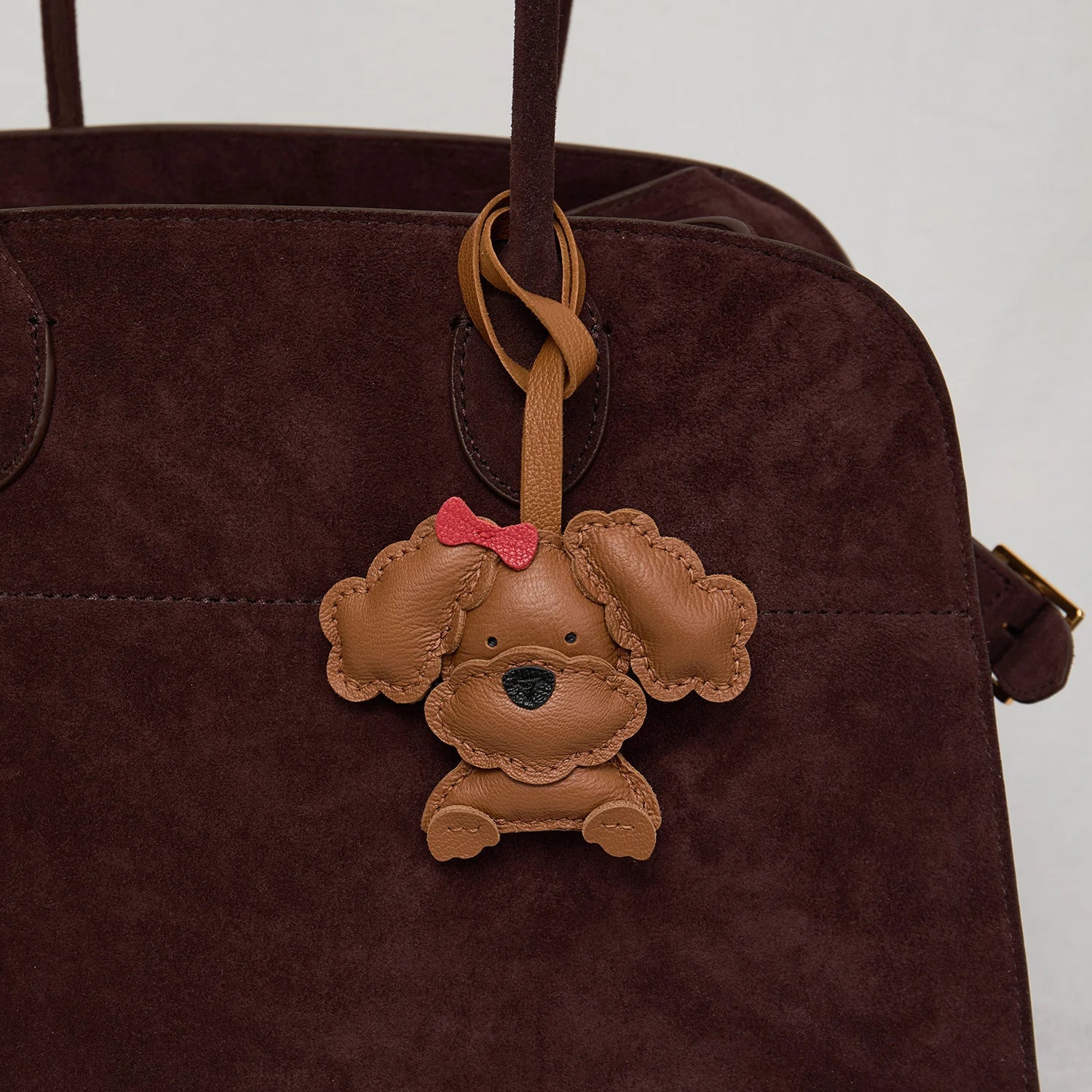 Charme de Sac en Cuir Noir avec Panneau Blanc et Joues Roses – Porte-Clés Élégant et Durable en Cuir de Chèvre