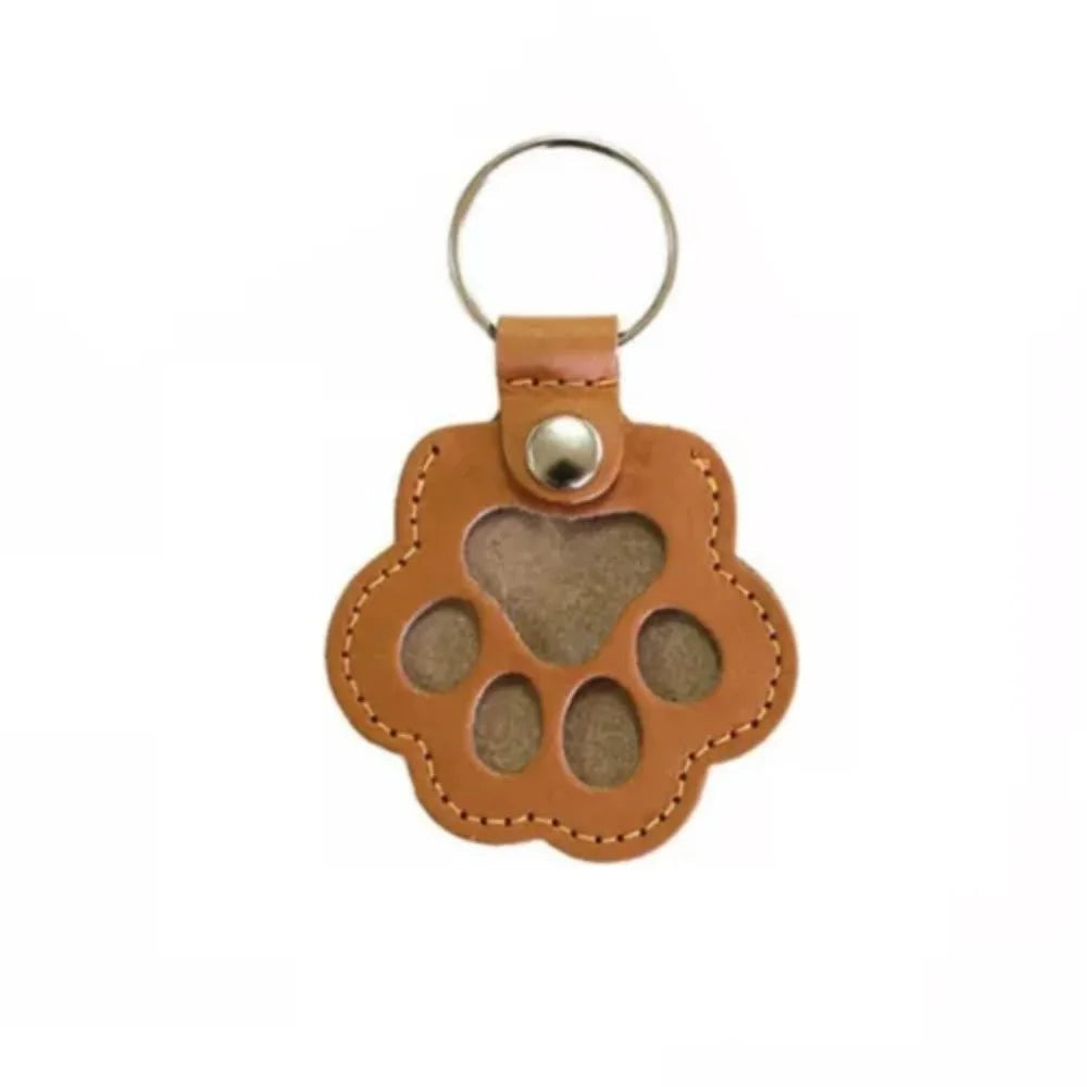 Porte-Clés en Cuir PU en Forme de Patte avec Rangement pour Poils d'Animaux – Accessoire Pratique Unisexe