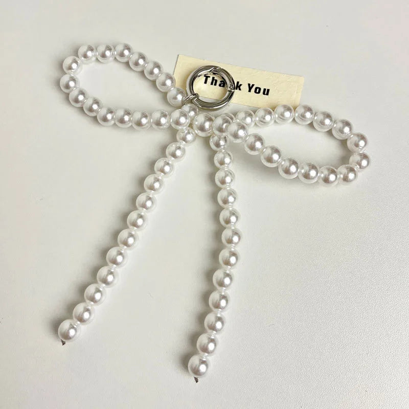 Porte-Clés en Perles avec Nœud en Métal Poli – Accessoire Chic pour Sac à Main et Clés