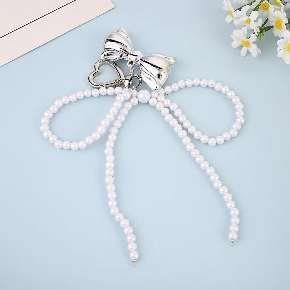 Porte-Clés en Perles avec Nœud en Métal Poli – Accessoire Chic pour Sac à Main et Clés