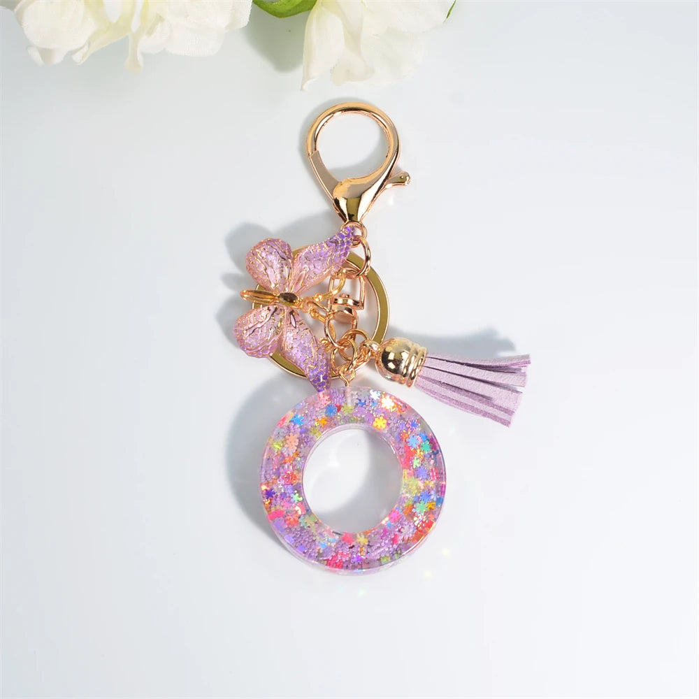 Porte Clés Personnalisé à Paillettes avec Charme Papillon et Gland – Accessoire Coloré pour Clés et Sacs
