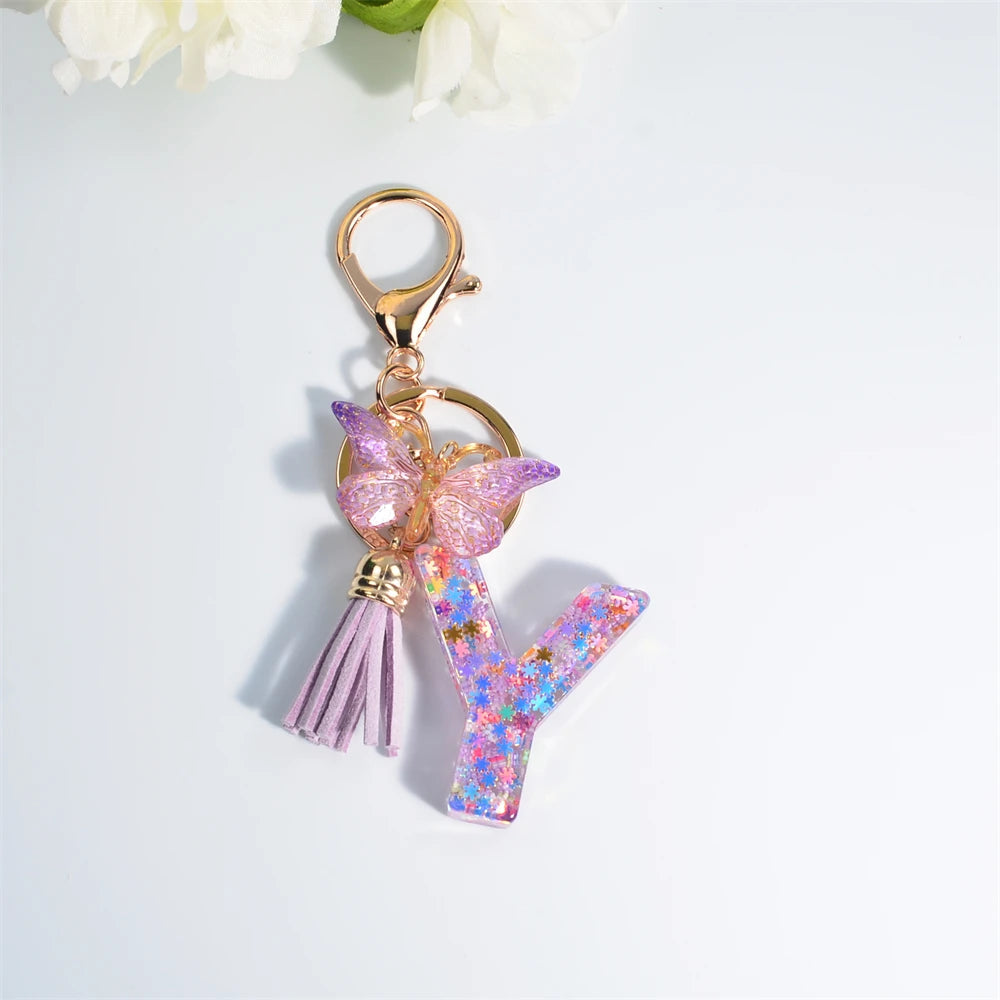 Porte Clés Personnalisé à Paillettes avec Charme Papillon et Gland – Accessoire Coloré pour Clés et Sacs
