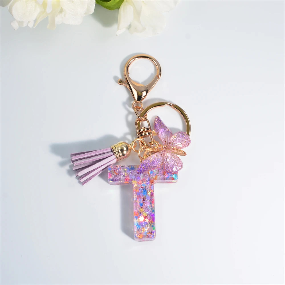 Porte Clés Personnalisé à Paillettes avec Charme Papillon et Gland – Accessoire Coloré pour Clés et Sacs