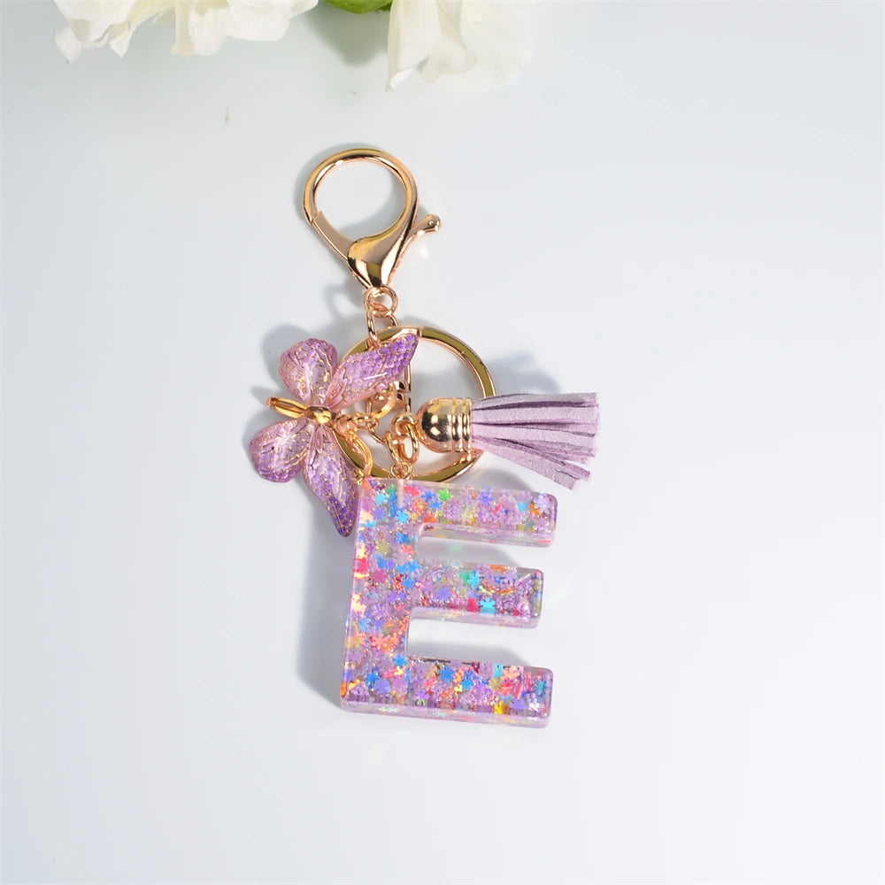 Porte Clés Personnalisé à Paillettes avec Charme Papillon et Gland – Accessoire Coloré pour Clés et Sacs