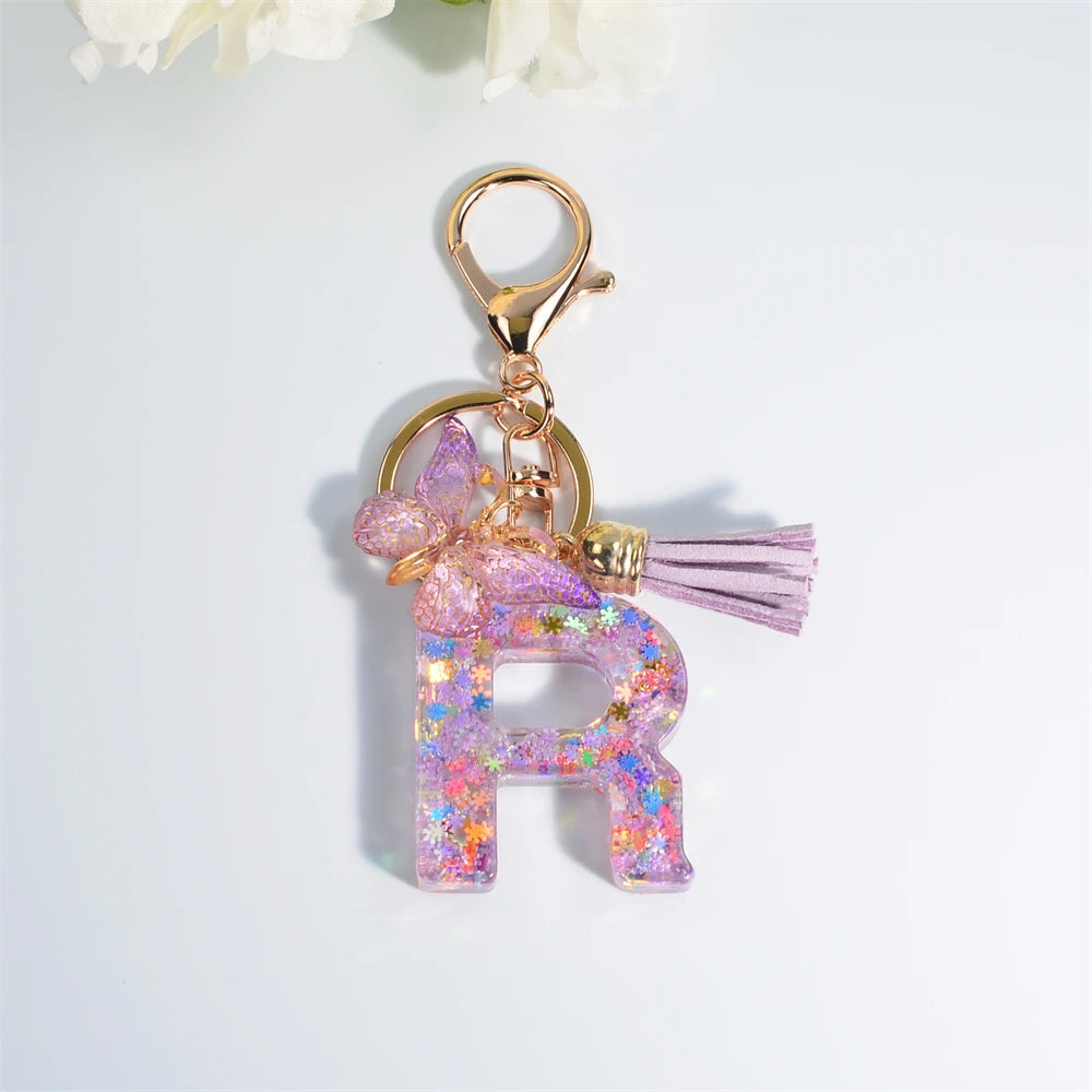 Porte Clés Personnalisé à Paillettes avec Charme Papillon et Gland – Accessoire Coloré pour Clés et Sacs