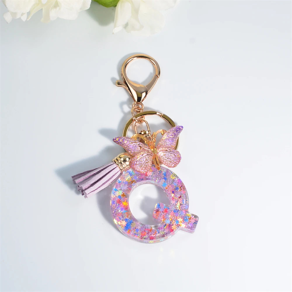 Porte Clés Personnalisé à Paillettes avec Charme Papillon et Gland – Accessoire Coloré pour Clés et Sacs