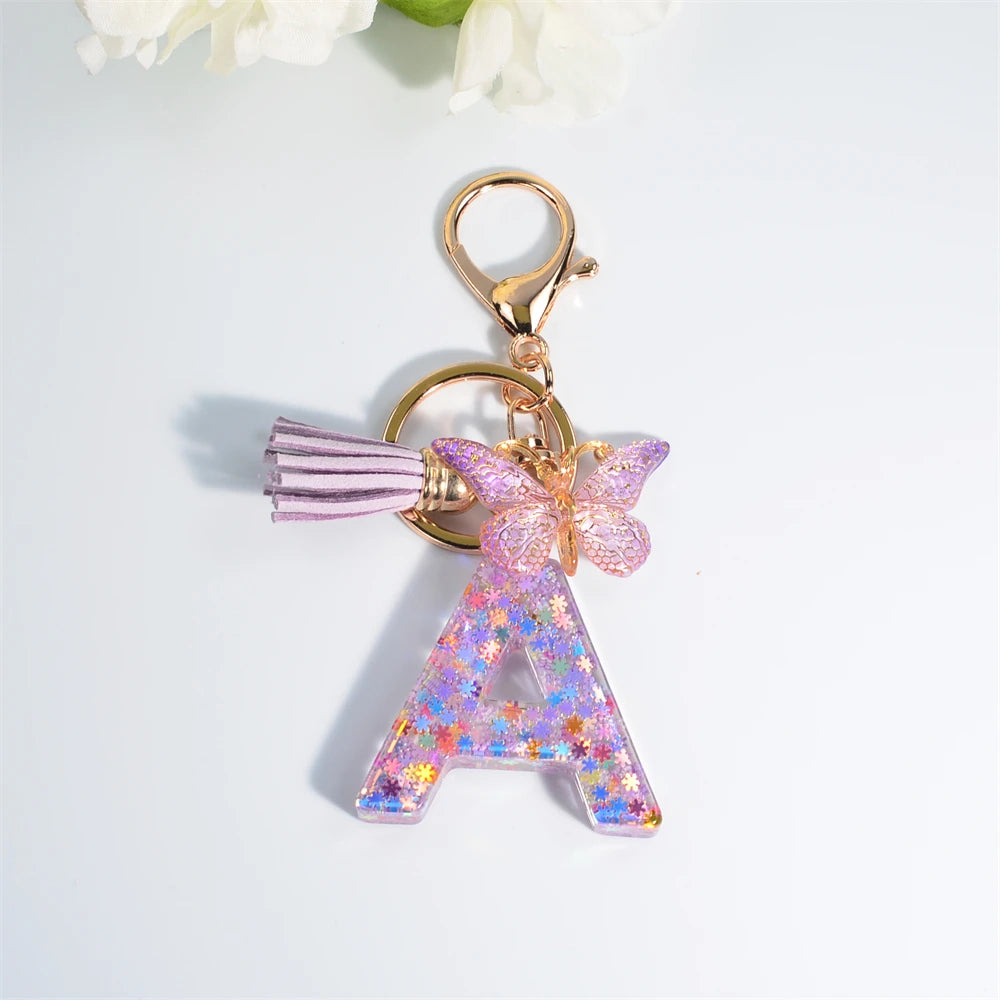 Porte Clés Personnalisé à Paillettes avec Charme Papillon et Gland – Accessoire Coloré pour Clés et Sacs
