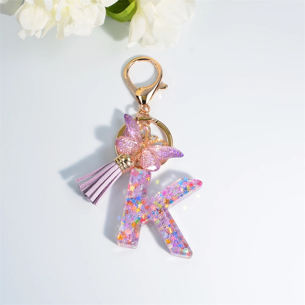 Porte Clés Personnalisé à Paillettes avec Charme Papillon et Gland – Accessoire Coloré pour Clés et Sacs