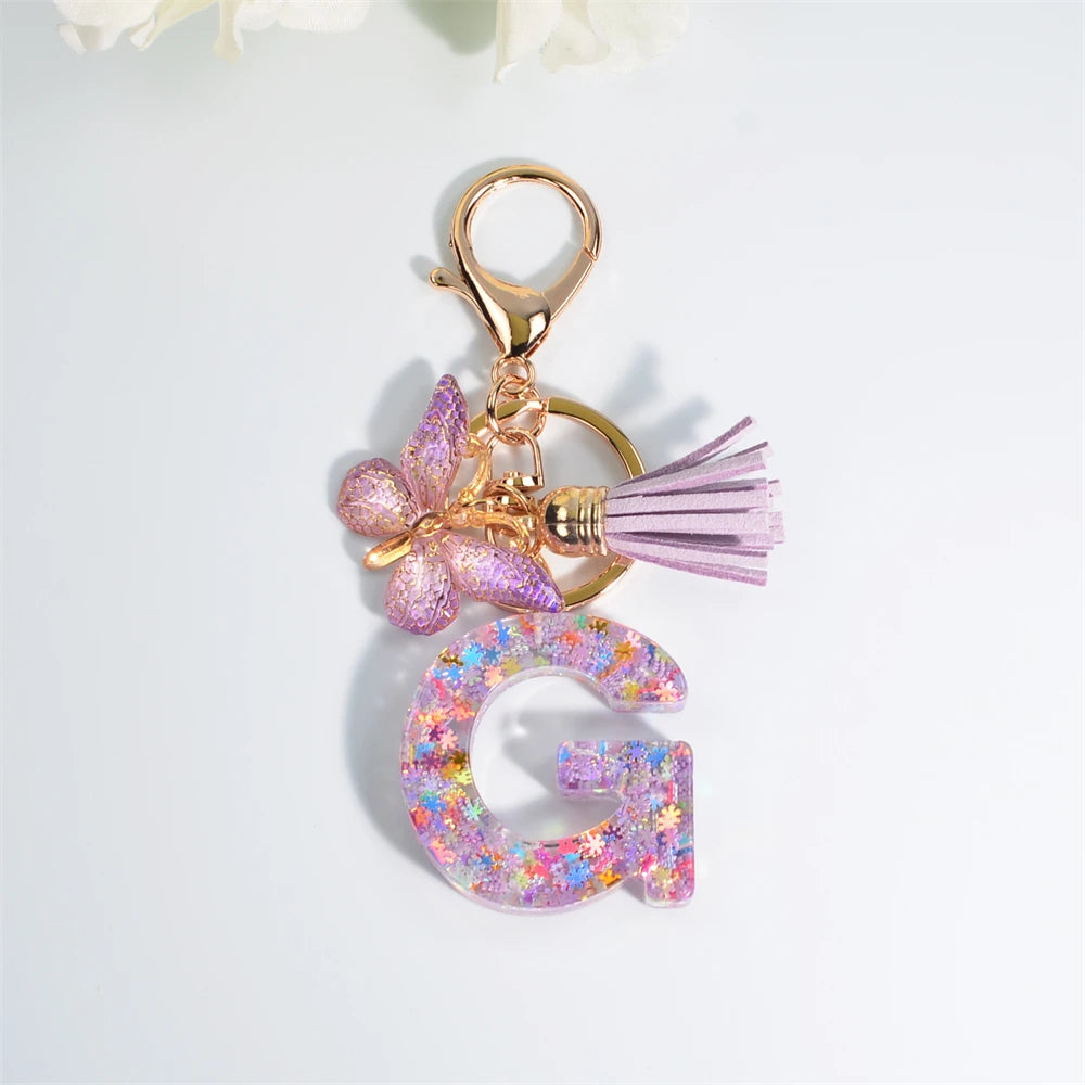 Porte Clés Personnalisé à Paillettes avec Charme Papillon et Gland – Accessoire Coloré pour Clés et Sacs