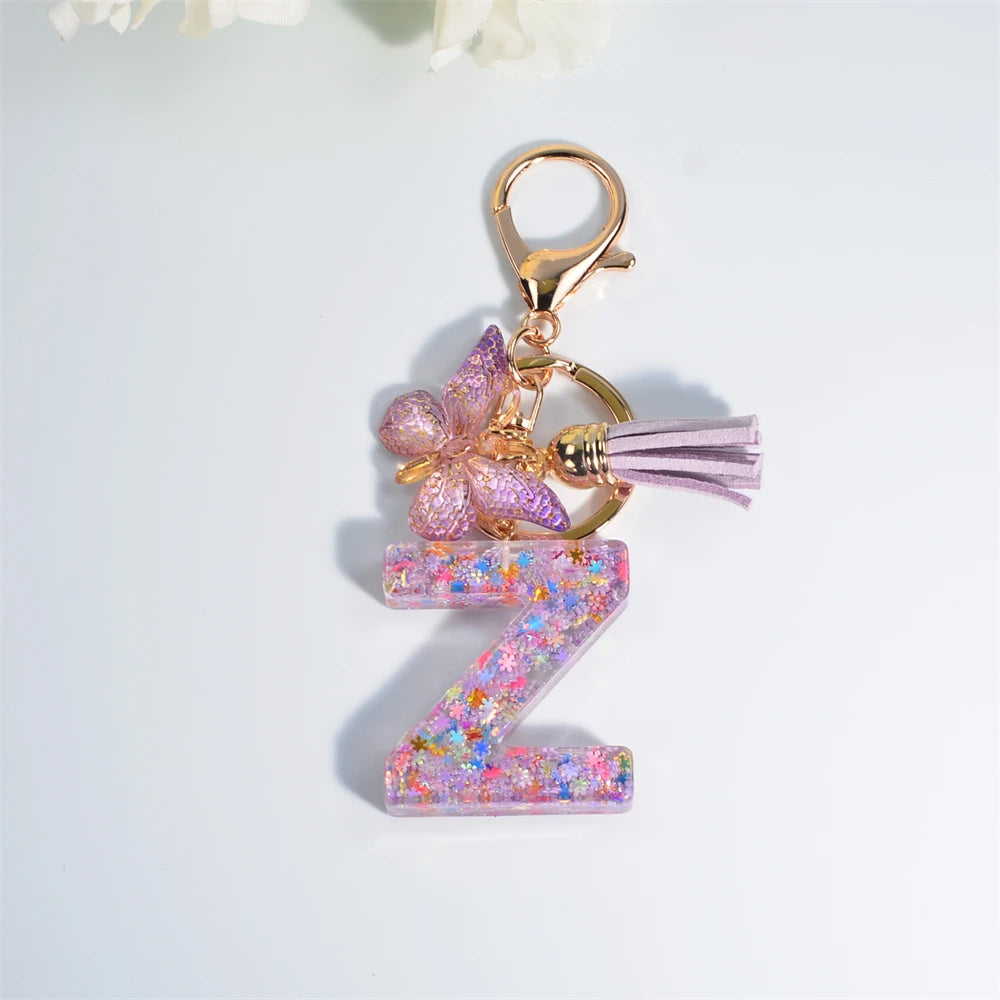 Porte Clés Personnalisé à Paillettes avec Charme Papillon et Gland – Accessoire Coloré pour Clés et Sacs