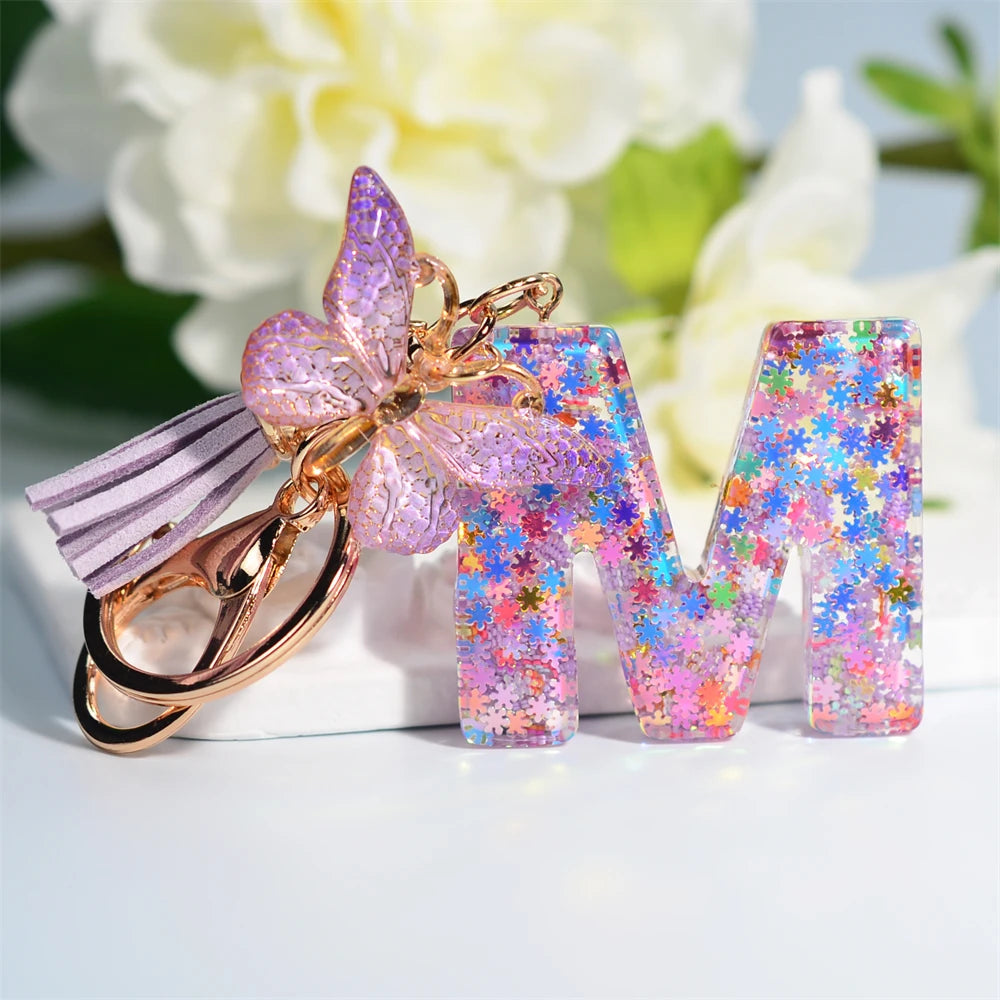 Porte Clés Personnalisé à Paillettes avec Charme Papillon et Gland – Accessoire Coloré pour Clés et Sacs