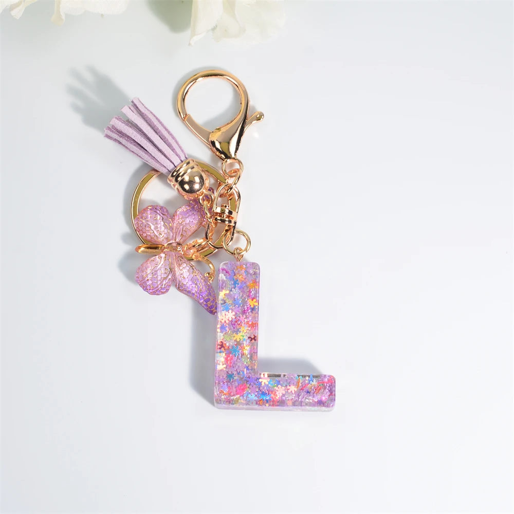 Porte Clés Personnalisé à Paillettes avec Charme Papillon et Gland – Accessoire Coloré pour Clés et Sacs