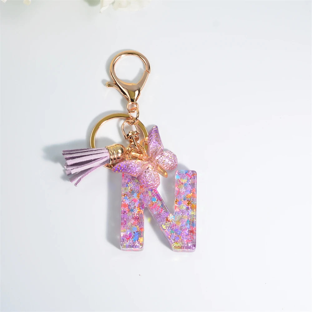 Porte Clés Personnalisé à Paillettes avec Charme Papillon et Gland – Accessoire Coloré pour Clés et Sacs
