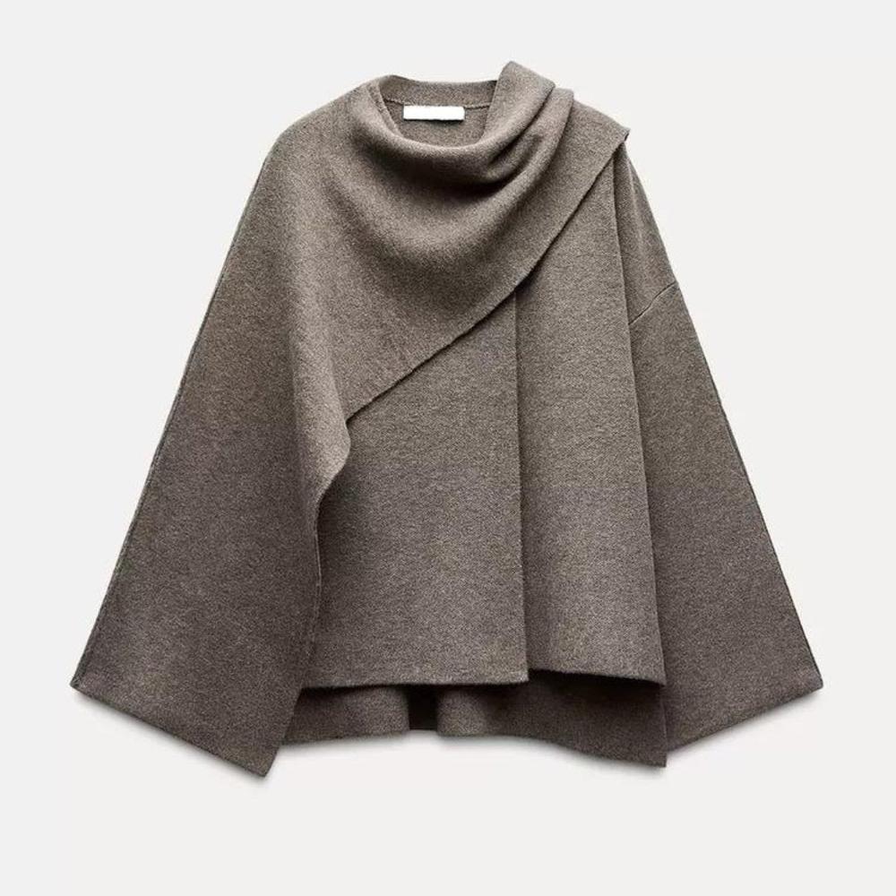 https://cdn.shopify.com/s/files/1/0934/1639/0995/files/elle-luxe-viral-cape-coat-267836.jpg?v=1745366906