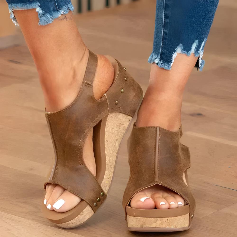 https://cdn.shopify.com/s/files/1/0934/1639/0995/files/orthopedic-womens-sandals-comfort-support-stylish.jpg?v=1745368187