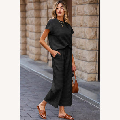 Casual Women's Set Black in Textured Fabric – Loose Top and Wide Pants with Pockets