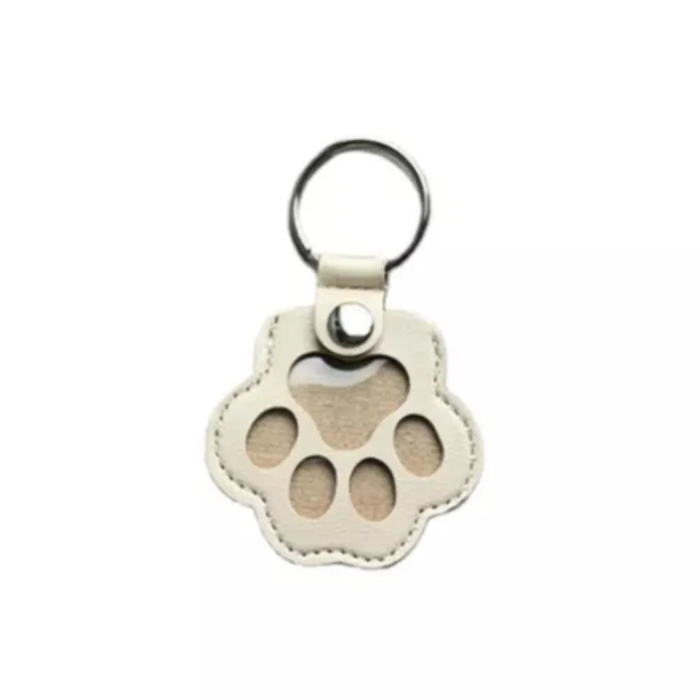 Porte-Clés en Cuir PU en Forme de Patte avec Rangement pour Poils d'Animaux – Accessoire Pratique Unisexe