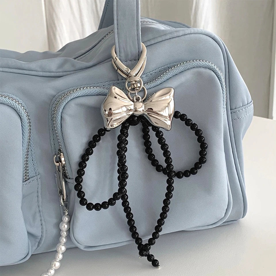 Porte-Clés en Perles avec Nœud en Métal Poli – Accessoire Chic pour Sac à Main et Clés