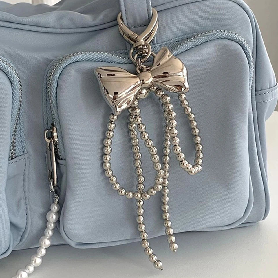 Porte-Clés en Perles avec Nœud en Métal Poli – Accessoire Chic pour Sac à Main et Clés