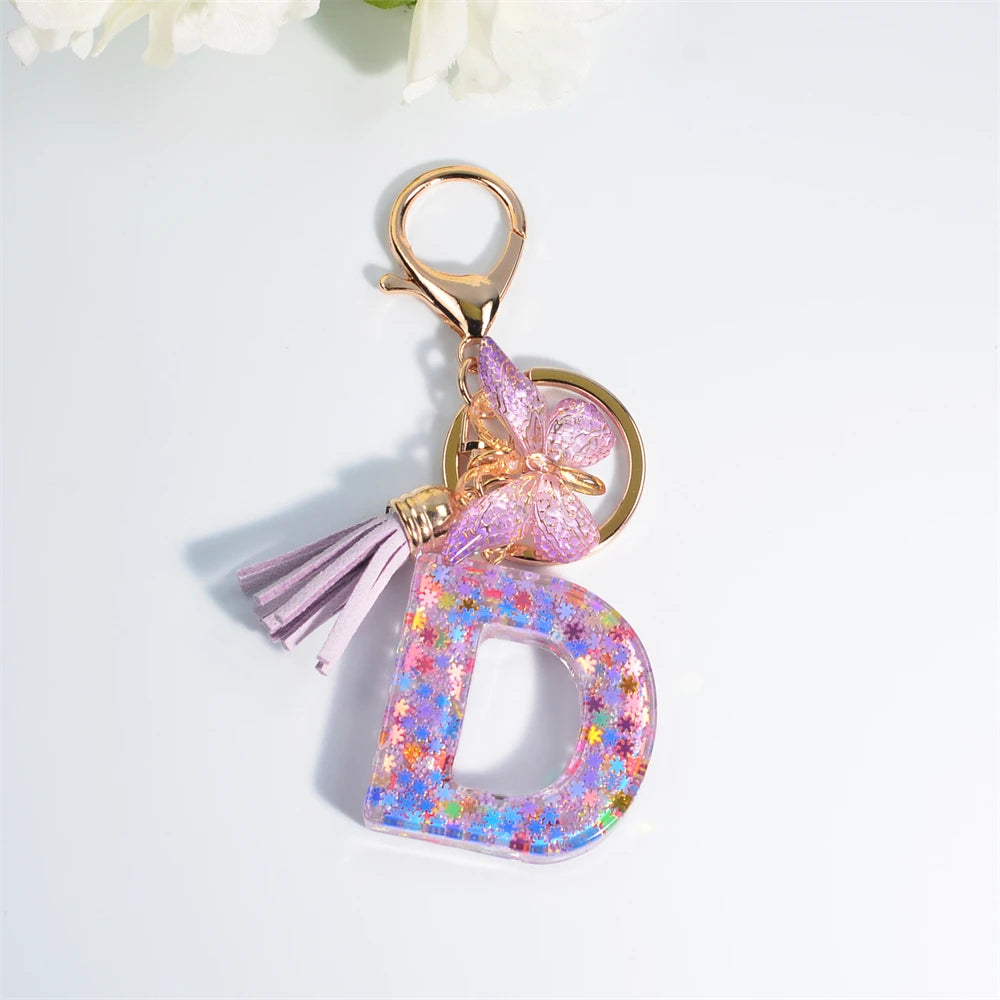 Porte Clés Personnalisé à Paillettes avec Charme Papillon et Gland – Accessoire Coloré pour Clés et Sacs