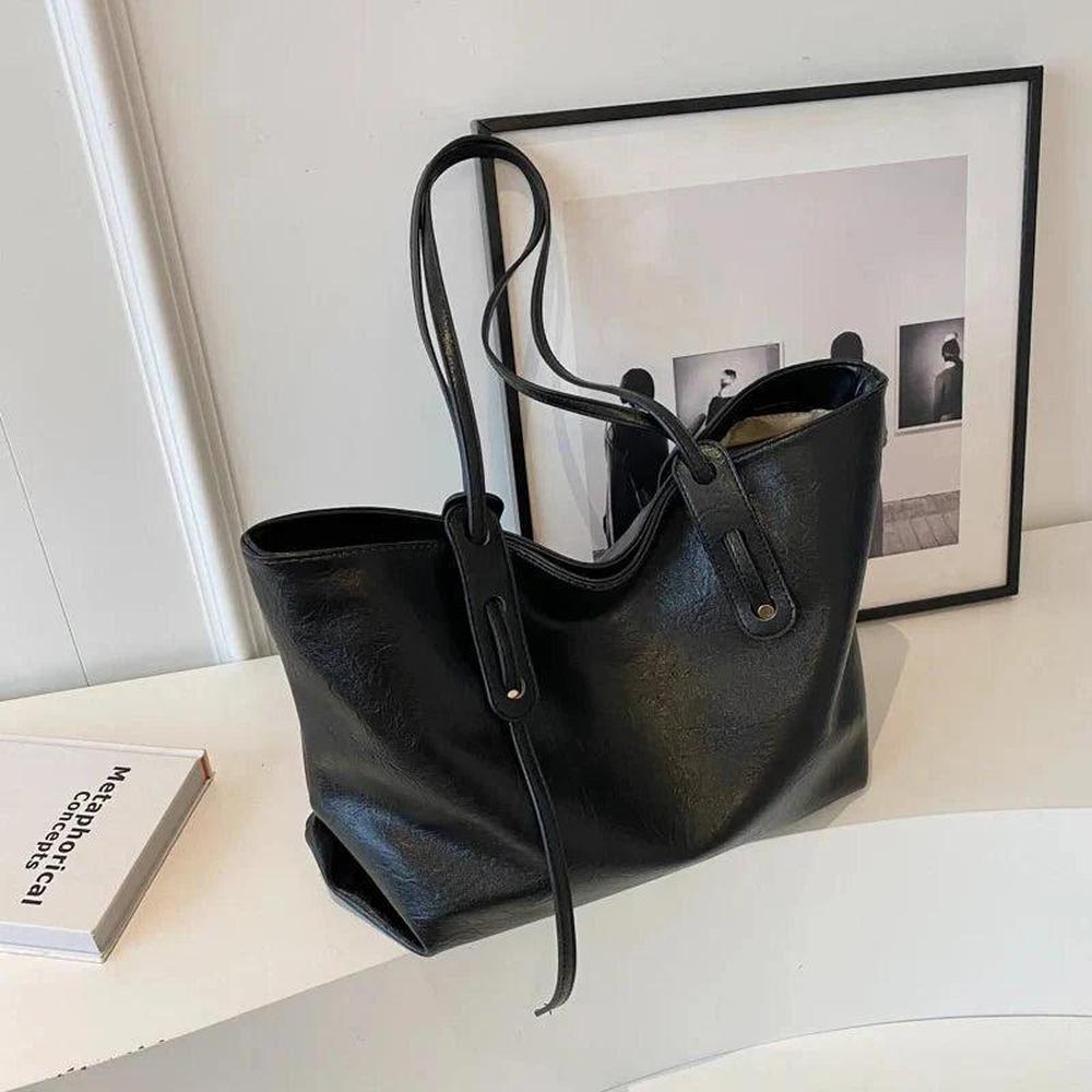 Sac à main femme en cuir noir avec bandoulière ajustable – Élégant et spacieux, modèle Solène