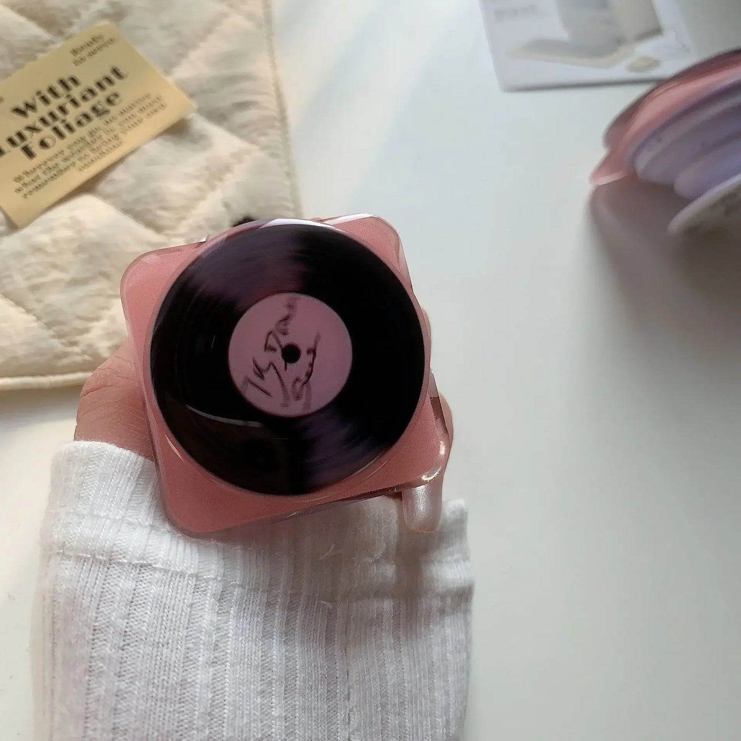 Pink Vinyl Rotating Phone Stand – Elegant Desk Accessory with 360° Rotation and Universal Compatibility