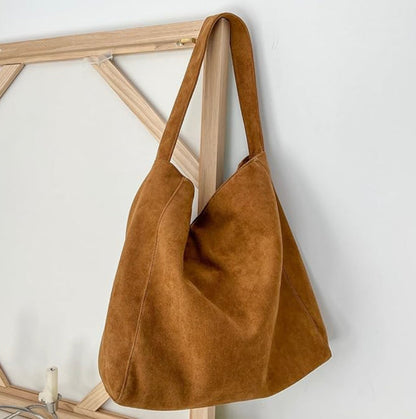 Women's leather handbag with removable shoulder strap – Elegant and practical, spacious interior, secure zipper closure