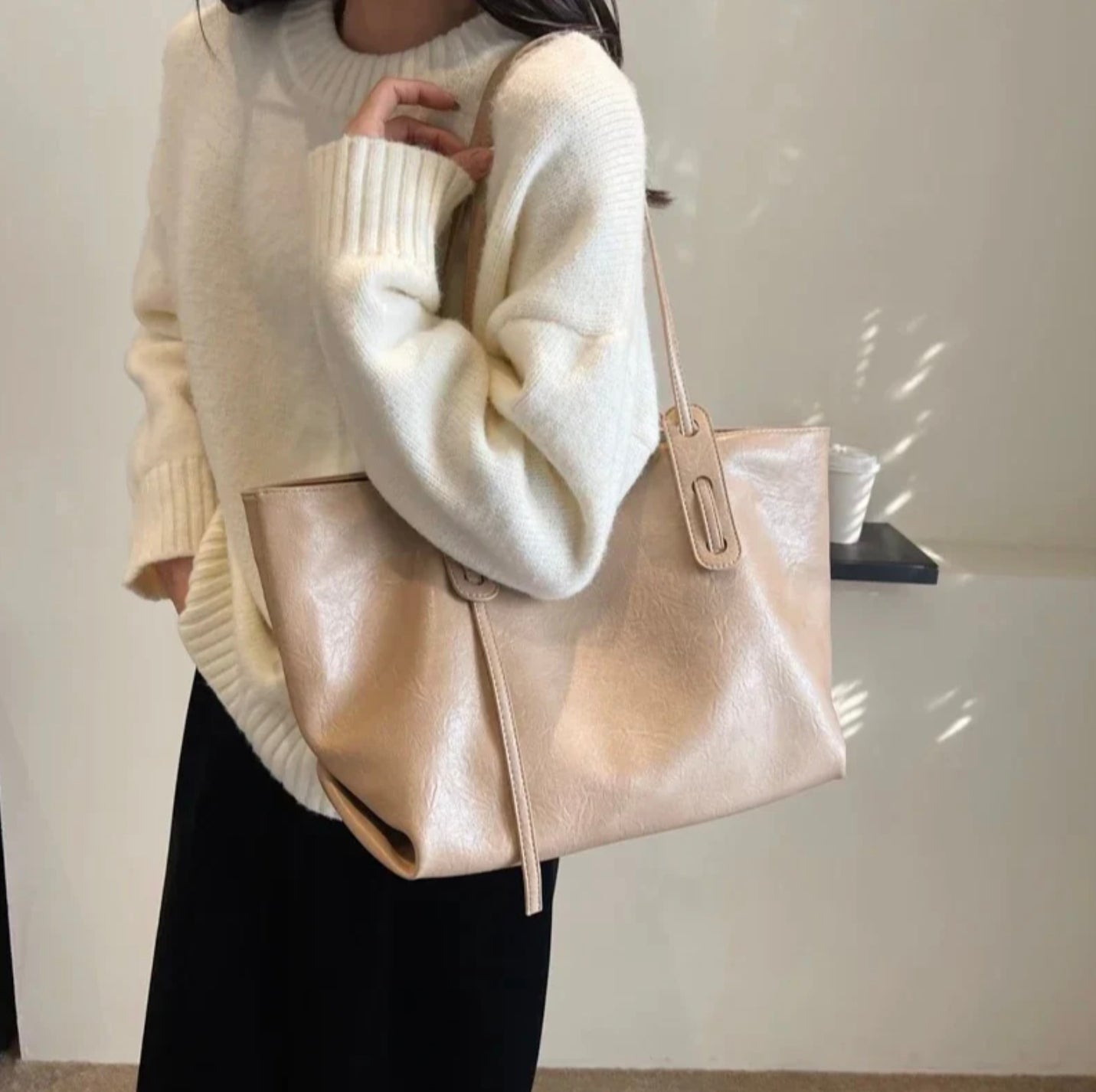 Women's black leather handbag with adjustable shoulder strap – Elegant and spacious, Solene model