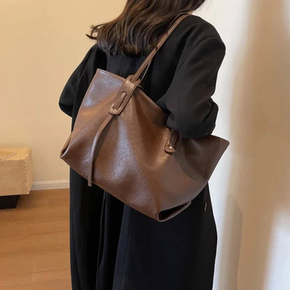 Women's black leather handbag with adjustable shoulder strap – Elegant and spacious, Solene model