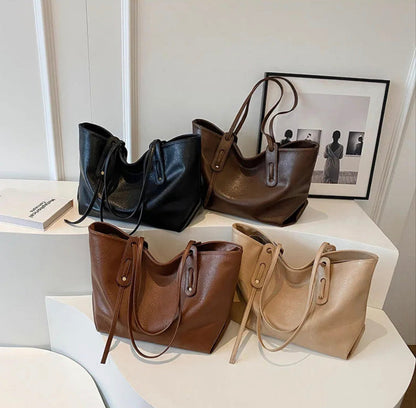 Women's black leather handbag with adjustable shoulder strap – Elegant and spacious, Solene model