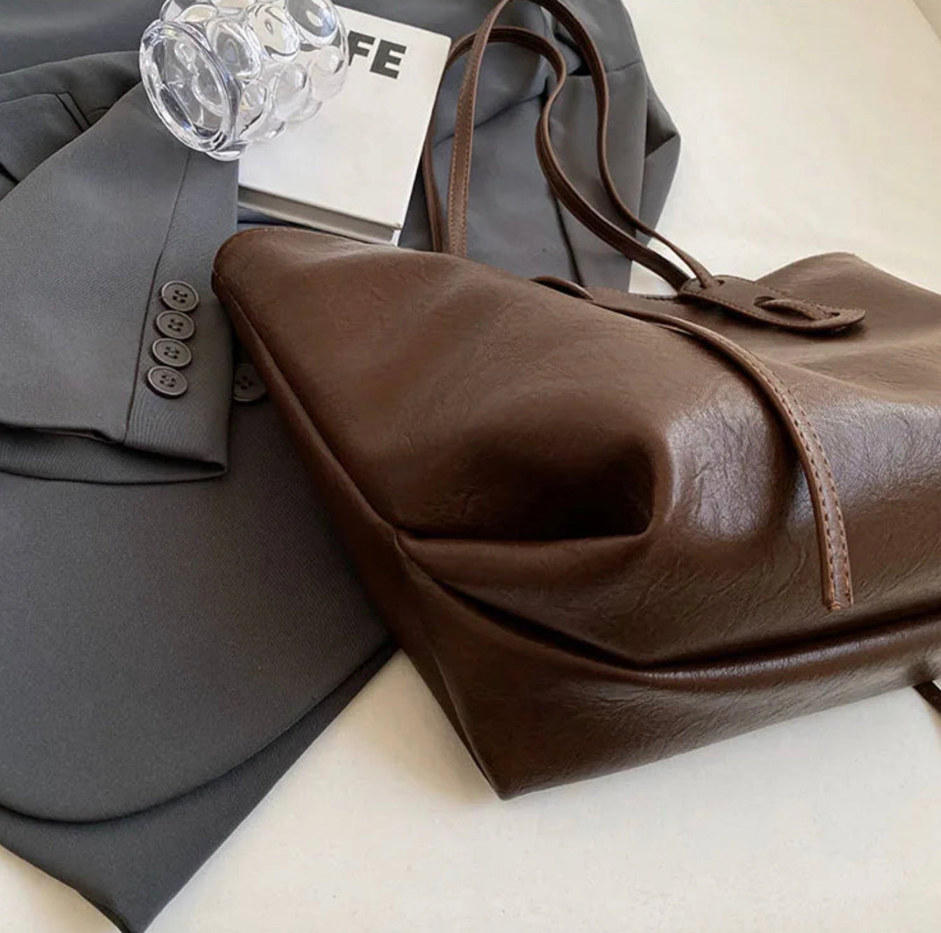 Women's black leather handbag with adjustable shoulder strap – Elegant and spacious, Solene model