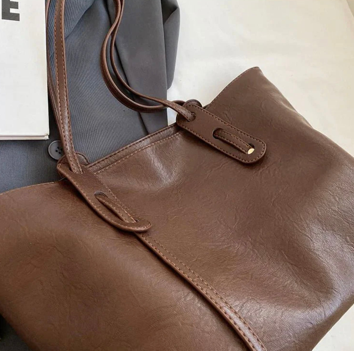 Women's black leather handbag with adjustable shoulder strap – Elegant and spacious, Solene model