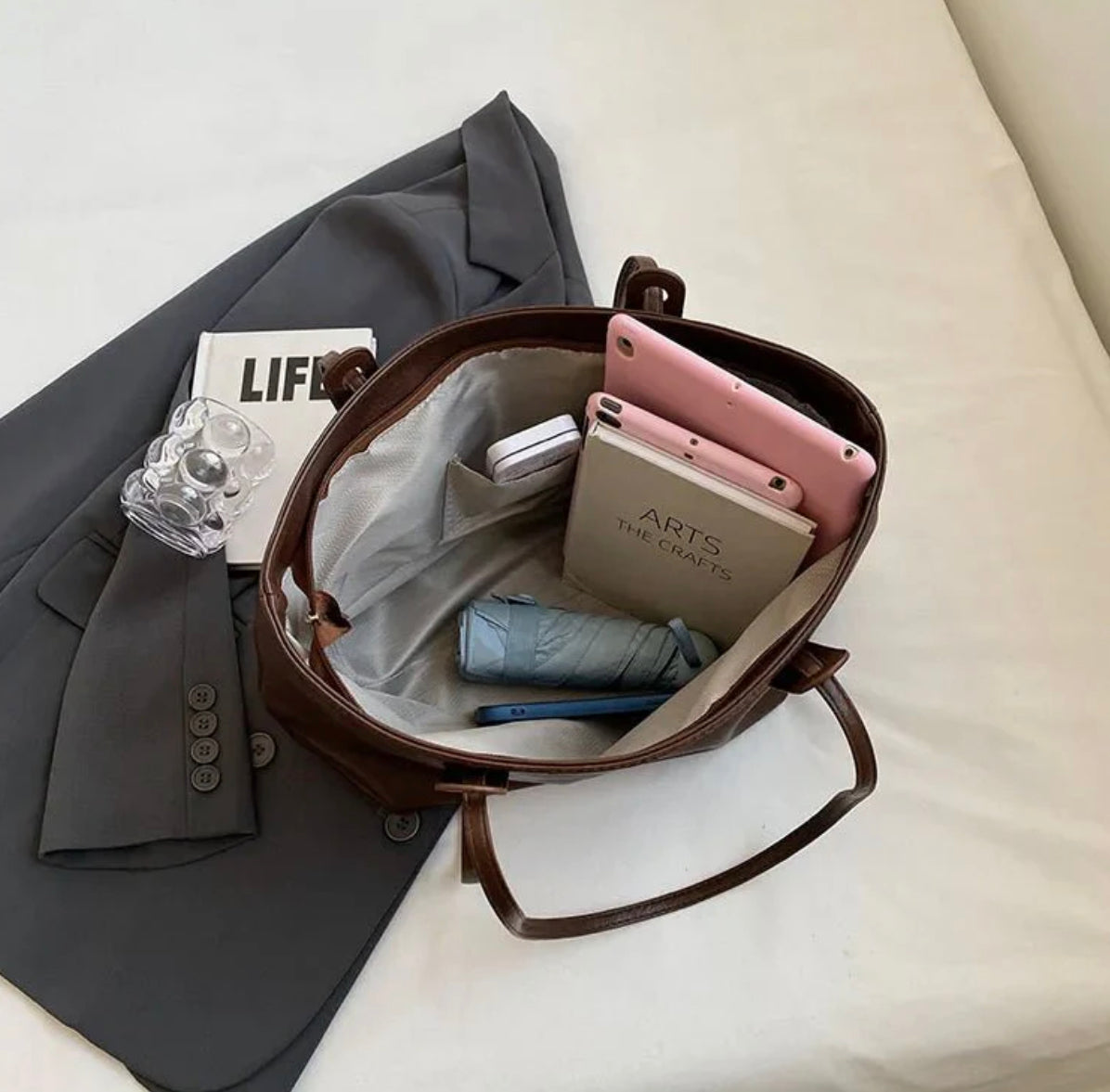 Women's black leather handbag with adjustable shoulder strap – Elegant and spacious, Solene model