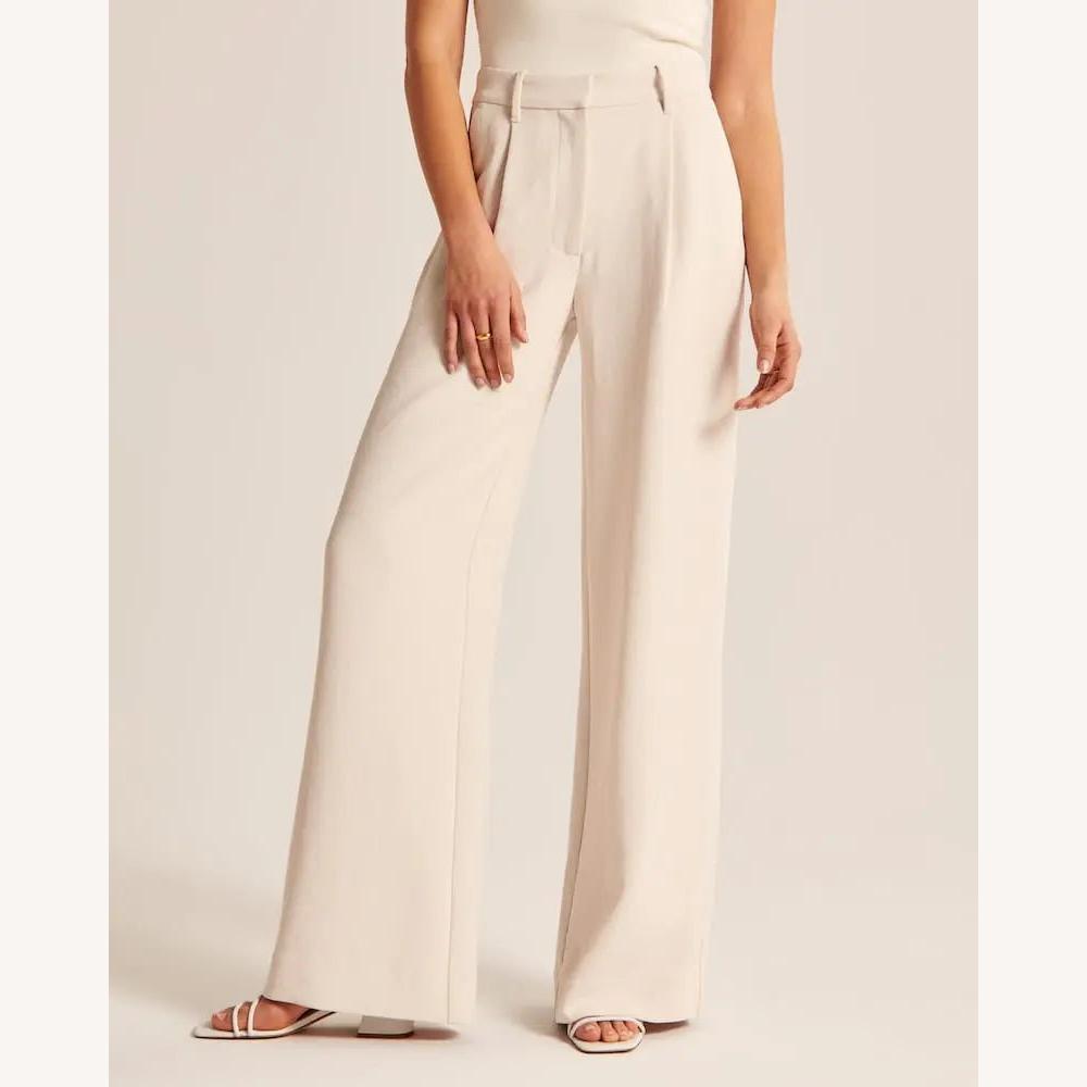 https://cdn.shopify.com/s/files/1/0934/1639/0995/files/bella-stride-wide-leg-pants-231268_1.jpg?v=1745367436