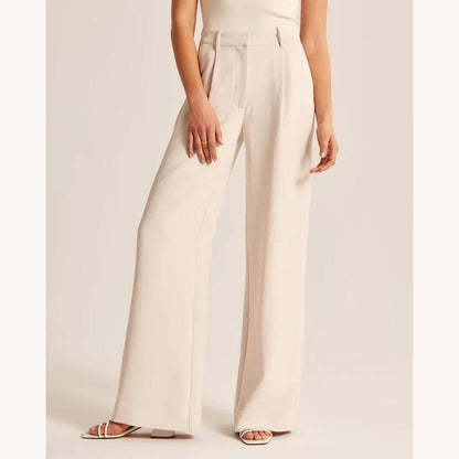 https://cdn.shopify.com/s/files/1/0934/1639/0995/files/bella-stride-wide-leg-pants-231268_1.jpg?v=1745367436
