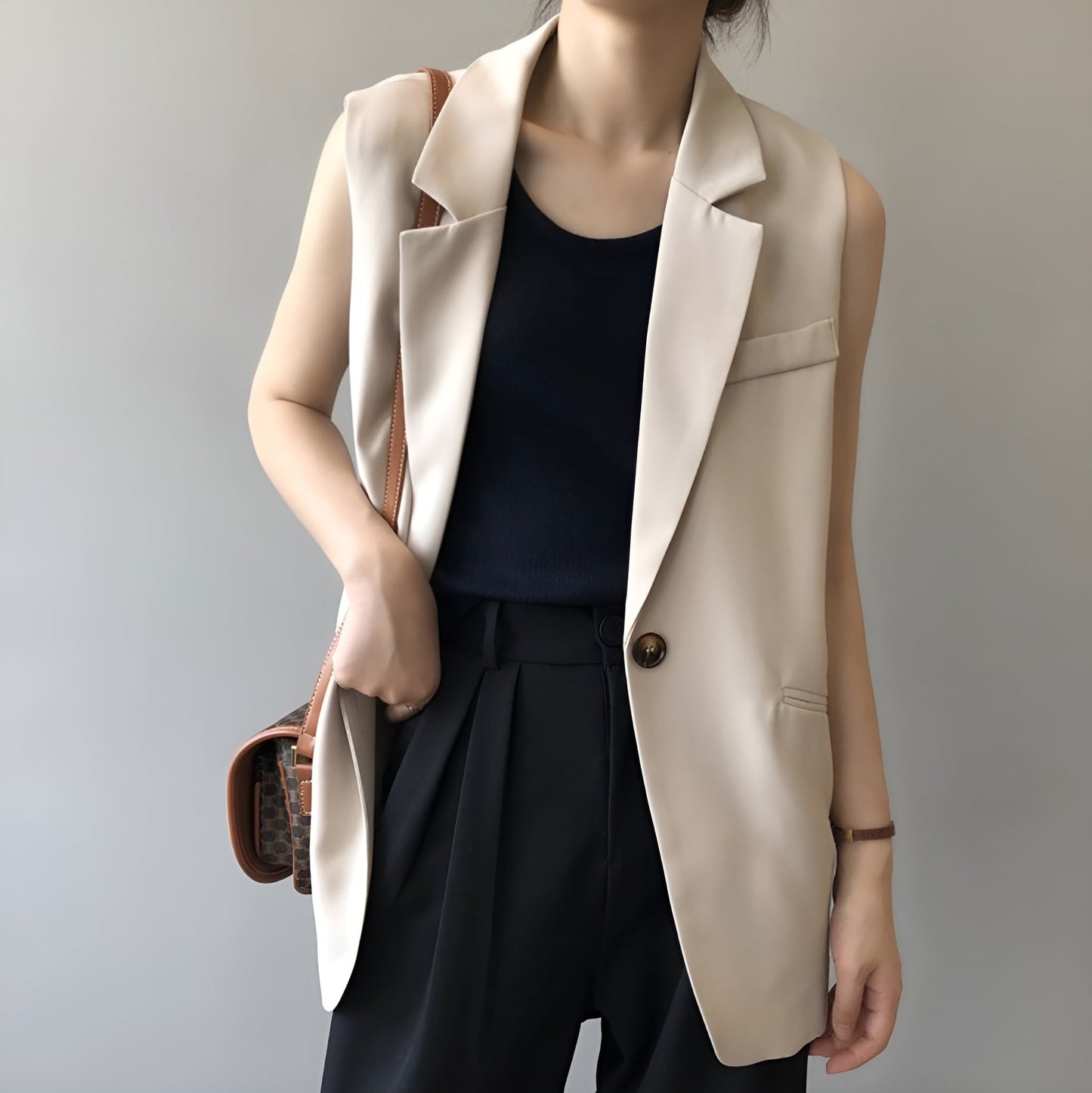 Elegant Sleeveless Women's Blazer in Polyester - Chic Minimalist Black Blazer Jacket, Fitted and Modern Cut